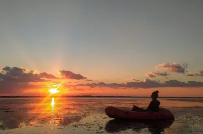 Lake Massaciuccoli kayaking at sunset with guide