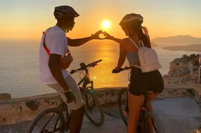 Feel the breeze on santorini’s coast, pedal through emporio’s old castelli, sip local wine in megalochori. includes hotel pickup, guide, and snacks.