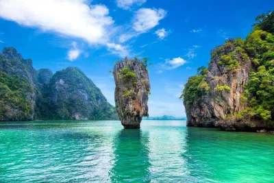 Feel the thrill of phang nga bay by speedboat—explore caves, canoe at hong island, swim near james bond island, and enjoy a thai lunch with pickup included.