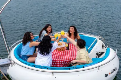 Self-Captained Electric Donut Boat on Lake Austin