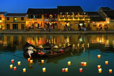 Explore a vila de coqueiros de hoi an em um barco cesto, caminhe pelas ruas antigas, solte lanternas no rio hoai e aproveite o mercado noturno. inclui traslado e jantar.