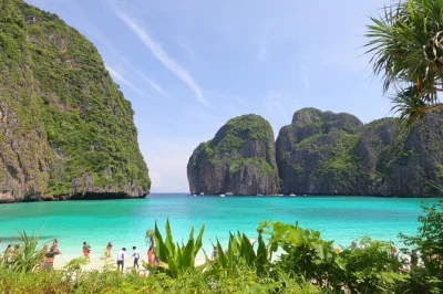 Wake up early on phi phi for a sunrise speedboat ride to maya bay, swim at phileh lagoon, snorkel with tropical fish, and relax on bamboo island with lunch included.