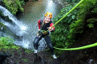 Dive into canyoning at ribeira dos caldeirões in são miguel—jumps, slides, and abseils with a local guide. includes equipment, pickup, and photos for memories.