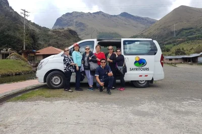 Cross the andes from cuenca to guayaquil with a stop in cajas park, photo breaks, and a family cocoa farm visit—includes pickup and lunch with local guide.
