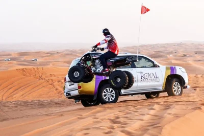 Vivez l’aventure du désert de dubaï avec dune bashing, quad, balade à dos de chameau, spectacles en live et dîner bbq. prise en charge à l’hôtel et guide local inclus pour une soirée sans s