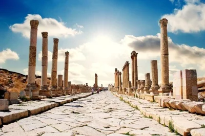 Step through roman ruins in jerash, climb ajloun castle’s towers, and gaze across the valleys from umm qais—private driver, hotel pickup, and local guide included.