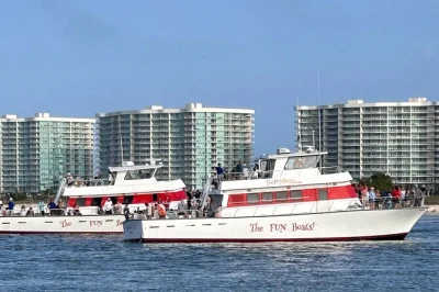 Feel the splash on a 2-hour orange beach dolphin cruise, meet local sea creatures, and join a family water fight. includes ac cabin, snacks, and restrooms.
