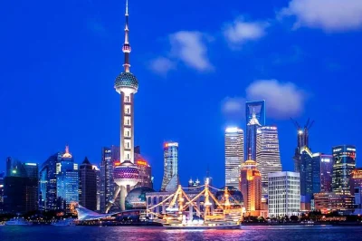 Feel shanghai’s lights from a huangpu river night cruise, then share xinjiang halal dishes on nanjing east road. includes hotel pickup and private guide.