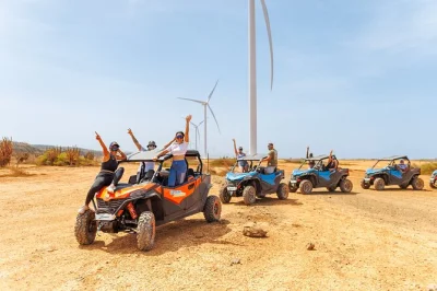 Feel the wind on curaçao’s wild west coast in a utv buggy, explore a hidden cave, watch waves at boca patrick, and swim at daaibooi beach. includes pickup.