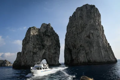 Sail from naples to capri with a mini cruise, see faraglioni & grottos, and wander capri’s villages. includes pickup, boat tour, and local guide support.