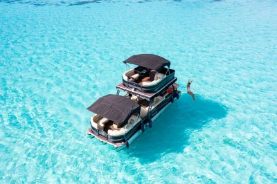 Feel the rush of moorea’s lagoon on a floating lounge tour. swim with black tip sharks, rays, and vibrant fish. includes snorkeling gear, fresh fruit, and drinks.