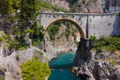 Step onto a classic gozzo in amalfi for a small group boat tour—swim under the cliffs, lunch at praiano’s la gavitella, and wander positano’s alleys. includes drinks.