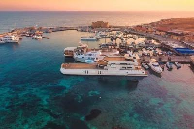 Step aboard in paphos for a sunset cruise with buffet dinner, open bar, live music, and fireworks. includes transfers and local drinks for a relaxed evening.