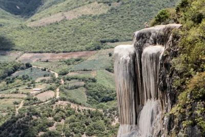 Feel the cool mist at hierve el agua, stand beneath the tule tree, explore mitla’s ruins, and taste mezcal with a local guide—includes air-conditioned transport.