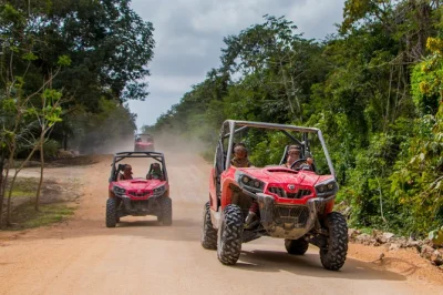 Feel the rush driving a jungle buggy near playa del carmen, swim in a natural cenote cave, and snack with locals. includes roundtrip pickup and snorkel gear.