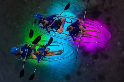 Watch the san marcos river come alive at dusk from a clear kayak, with glow lights, wildlife sightings, and a local guide. includes all gear and easy booking.