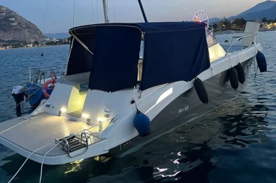 Découvrez la côte de palerme avec une balade en bateau tranquille vers la plage de mondello, capo gallo et ses grottes secrètes. nagez, faites du snorkeling, profitez d’encas et boissons – tout