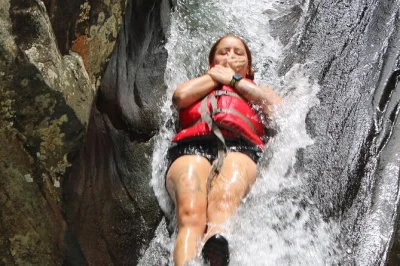 Feel the rush of el yunque’s natural waterslides, swim in rainforest pools, and hear local stories on this small-group tour with guide and all fees included.