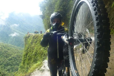 Ride bolivia’s death road from la paz to coroico. guided bike tour with safety gear, lunch, and hotel transfer. see waterfalls, jungle, and andes views.
