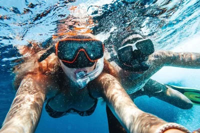 Feel curaçao’s vibrant sea life on a snorkel cruise to the famous tugboat wreck, enjoy a bbq lunch on board, and relax with open bar drinks. includes pickup.