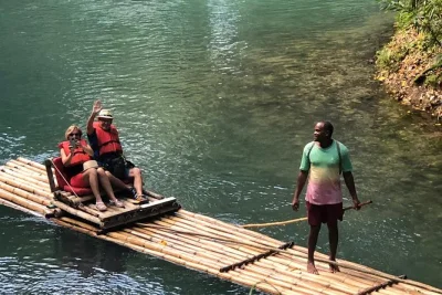 Float down jamaica’s martha brae river on a private bamboo raft, guided by a local captain. includes pickup, music, riverbank stops for fruit and souvenirs.