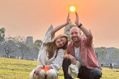 Angkor wat all’alba senza folla, esplora le rovine di ta prohm immerse nella giungla e cammina tra i corridoi antichi con guida locale—include pick-up in hotel e acqua fresca.