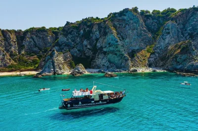 Feel the salt air on a 3-hour costa degli dei boat tour with swimming stops, local bruschetta & calabrian wine. includes aperitif, guide, and tropea coastline views.