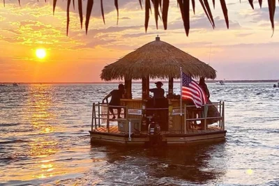 Feel the breeze on a sunset tiki cruise in panama city beach, byob style. drift past waterfront homes, spot dolphins, and enjoy your playlist with ice and water included.