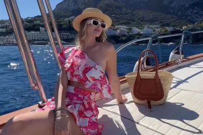 Float along capri’s coast on a private gozzo boat, see the faraglioni rocks, explore sea grottoes, and swim in clear water. includes local skipper and drinks.