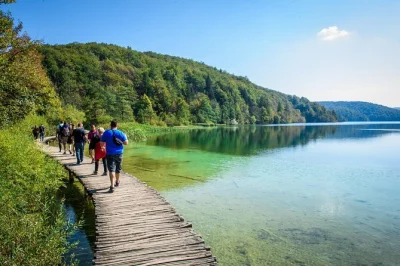 Feel the spray of plitvice lakes’ waterfalls on a guided day trip from zagreb, with boat and tram rides, plus a chance for local lunch. includes all fees & transport.