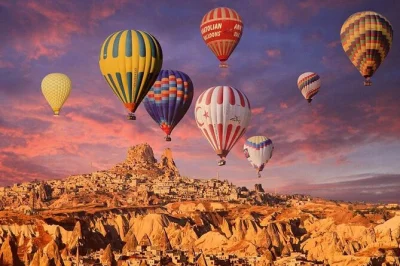 Erlebe kappadokien: Übernachte im höhlenhotel, erkunde märchenhafte täler und schwebe bei sonnenaufgang im heißluftballon. inkl. transfer ab antalya, guide & mahlzeiten.
