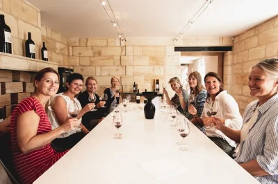 Feel the charm of saint-emilion on a small group wine tour with tastings, medieval village strolls, and a french picnic lunch. includes guide and transport.