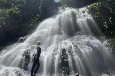 Wake up to puerto rico’s mountain air, hike to wild waterfalls, sip fresh local coffee, and swim in natural pools—small group tour with pickup from san juan.