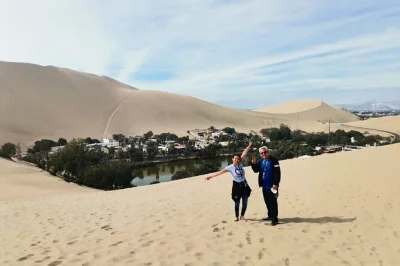 Sinta a brisa do mar nas ilhas ballestas, prove pisco em ica e deslize pelas dunas de huacachina com guia bilíngue e transporte confortável saindo de paracas.
