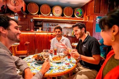Feel the pulse of barcelona’s born with a tapas dinner, local wines, and a flamenco show in a medieval palace—includes walking tour and drinks at two bars.