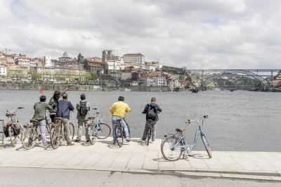 Pedal through porto’s riverside, city parks, and atlantic beaches on a private bike tour. includes local guide, bikes, and helmet for a relaxed morning adventure.