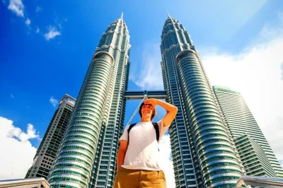 Feel the pulse of kuala lumpur on a private tour with petronas twin towers, batu caves, chinatown, and more. includes hotel pickup and entry tickets.