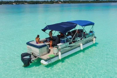 Feel the calm of bacalar’s lagoon of 7 colors on a pontoon tour with a local guide, free kayaks, and beach club access. includes snacks, drinks, and pickup options.