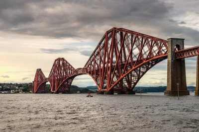 Hear highland cattle, taste whisky at deanston or explore blackness castle, and relax by lochs on this day trip from edinburgh with a local guide and coach pickup.