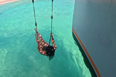 Feel the caribbean breeze on a luxury catamaran to icacos, with water slides, puerto rican lunch, unlimited drinks, and guided snorkeling—includes pickup.