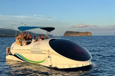 Peer through a glass bottom boat in são miguel, azores, snorkel the clear waters near vila franca do campo islet, and learn from a local biologist guide. gear included.