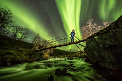 Chase the northern lights from tromsø in a small group with a pro photographer, homemade soup, thermal suits, and campfire. includes pickup and warm gear.