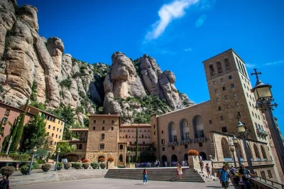Feel the cool mountain air at montserrat, wander its monastery, then relax at a family winery with a farmhouse lunch and wine tasting—all with pickup from barcelona.