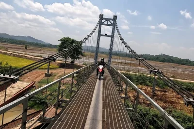 Wake to lake mist in lak, ride mountain passes, swim at dray sap waterfall, and share bbq with locals on this central highlands motorbike adventure. includes hotel pickup.