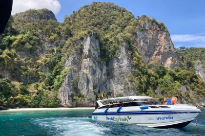 Wake up early for a speedboat day trip from krabi to phi phi, maya bay, and 4 islands. swim, snorkel, and enjoy a thai buffet lunch with hotel pickup included.