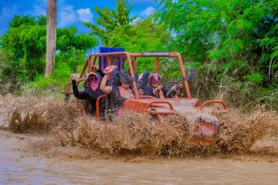 Get muddy on a punta cana buggy tour with organic farm tastings, a water cave swim, and time at macao beach. includes pickup and local guide.