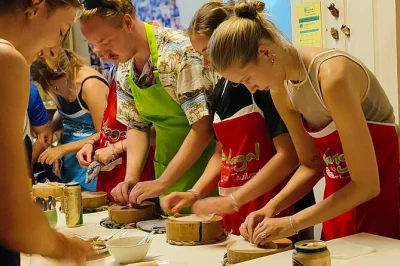 Start your chiang mai evening with a lively market visit, then cook four classic thai dishes in a small group class. includes hotel pickup and all ingredients.