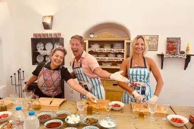 Step inside a santorini cave house for a hands-on cooking class, bake local dessert, and share a 5-course lunch with assyrtiko wine. includes all ingredients and guidance.