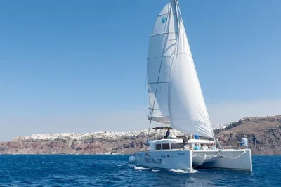 Swim by red & white beach, savor fresh greek bbq on board, and sail near santorini’s volcano. includes hotel pickup, drinks, snorkeling gear, and small group vibe.