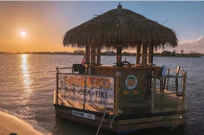 Feel the sea breeze on a 90-minute sunset cruise in orange beach, drifting past islands on a floating tiki bar. includes drinks, music, and local guide.